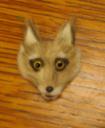 Fox pin made of rabbit fur.